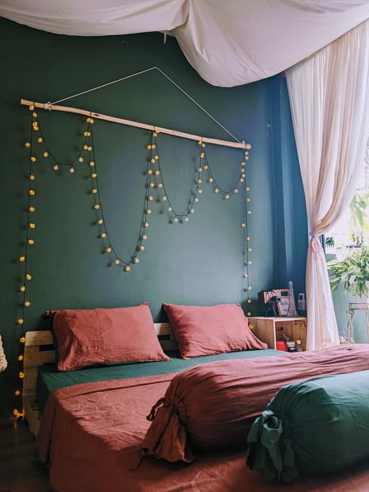 Seaweed and Brick Bamboo Linen in a Boho Pallet Bedroom