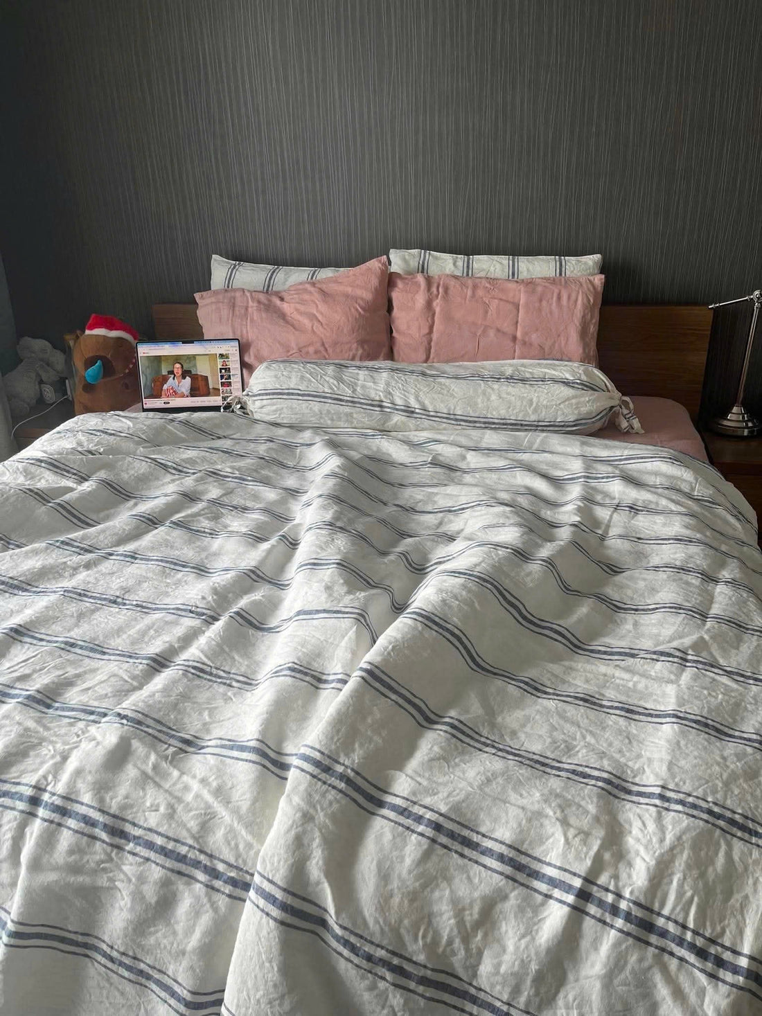 Real bedroom styled with Wide Striped French Linen Duvet Cover in white and blue stripes with blush pink pillows