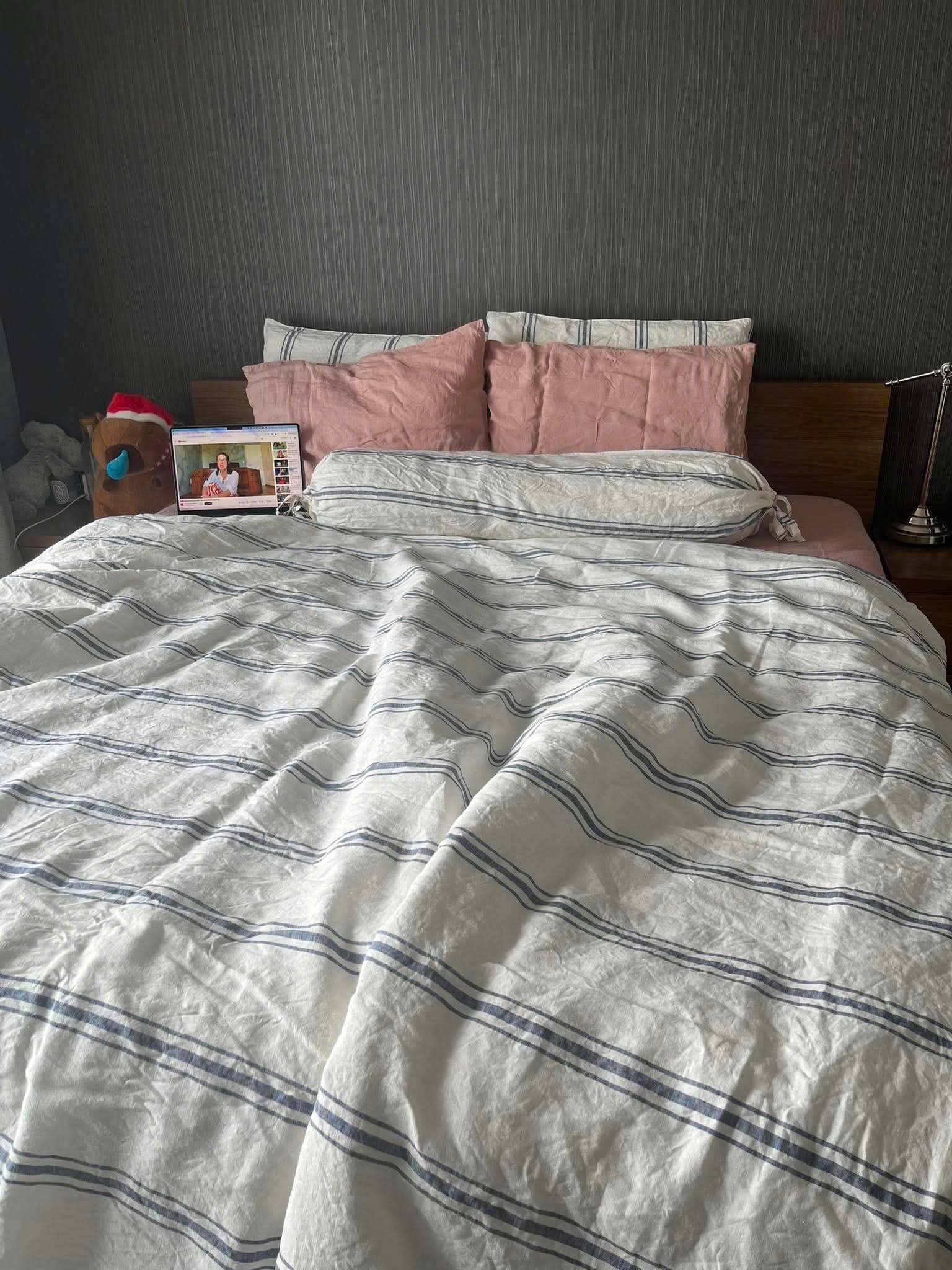 Real bedroom styled with Wide Striped French Linen Duvet Cover in white and blue stripes with blush pink pillows