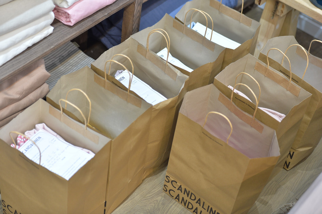 SCANDALINEN linen bedding orders packed in kraft paper bags ready for delivery