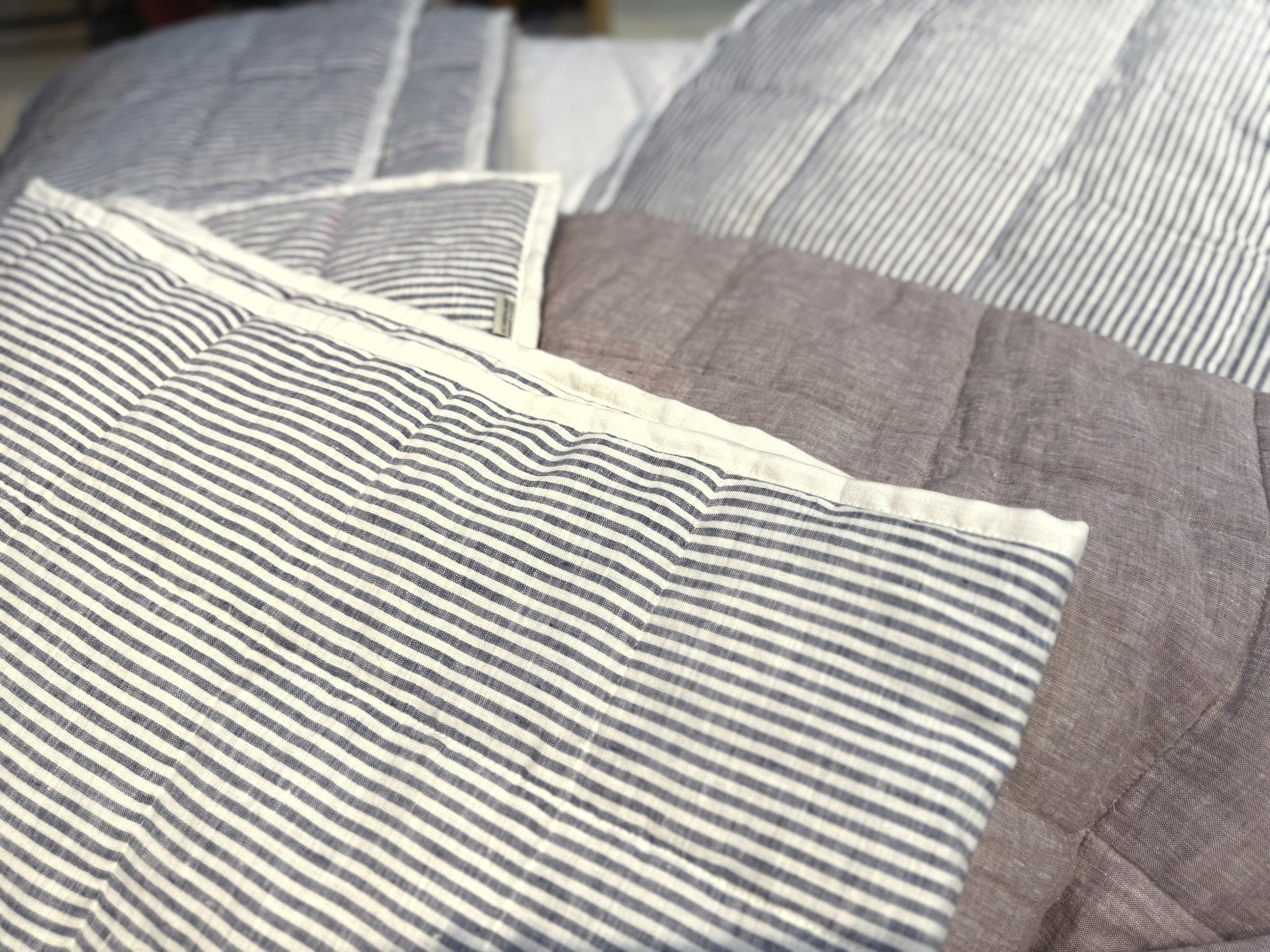 Hand-Quilted French Linen Blanket – Navy Pinstripe