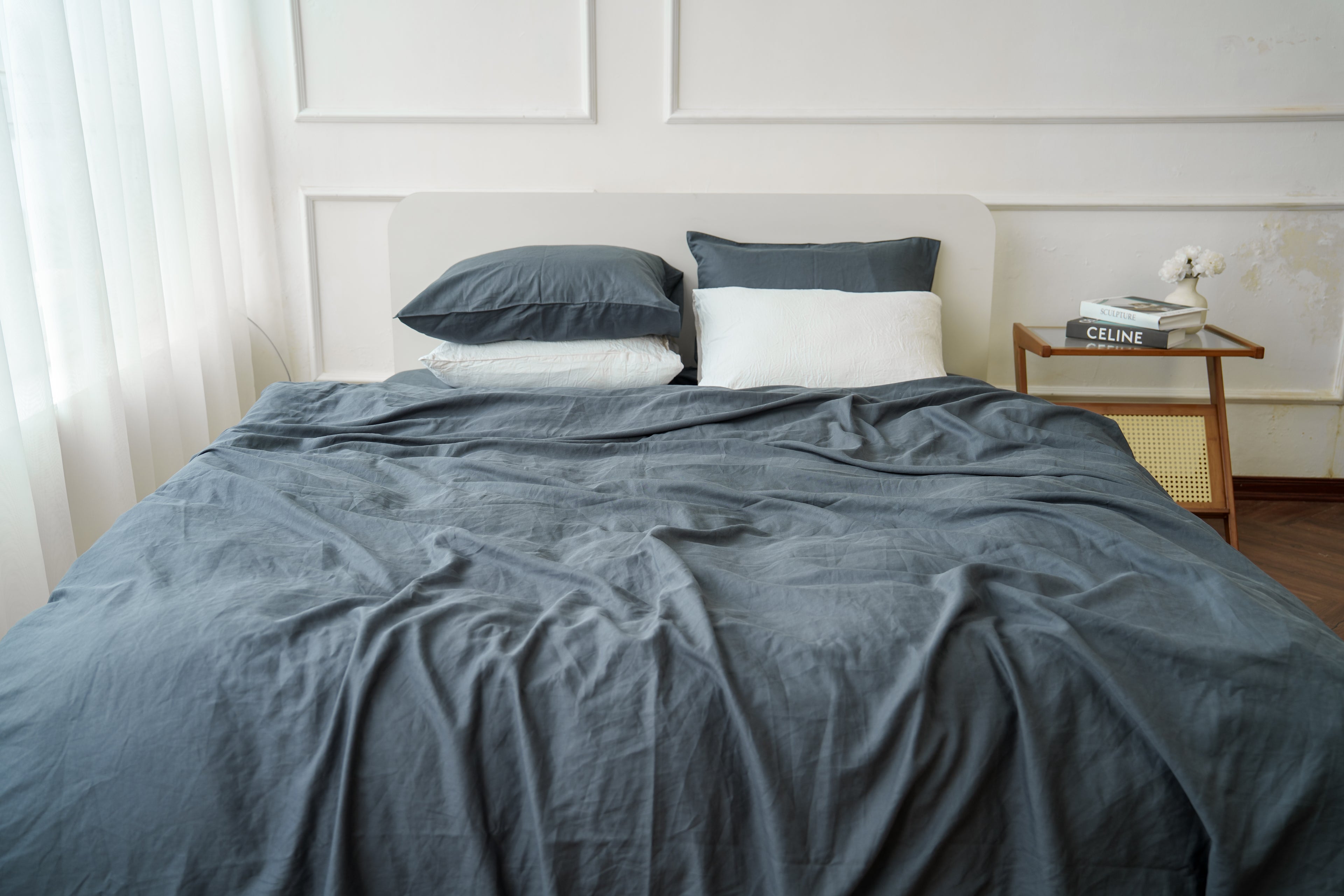 Grey bamboo linen fitted sheet on a bed, 70% bamboo 30% linen, breathable - SCANDALINEN