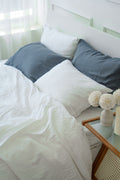 Grey bamboo linen pillowcase on a bed, 70% bamboo 30% linen, breathable - SCANDALINEN