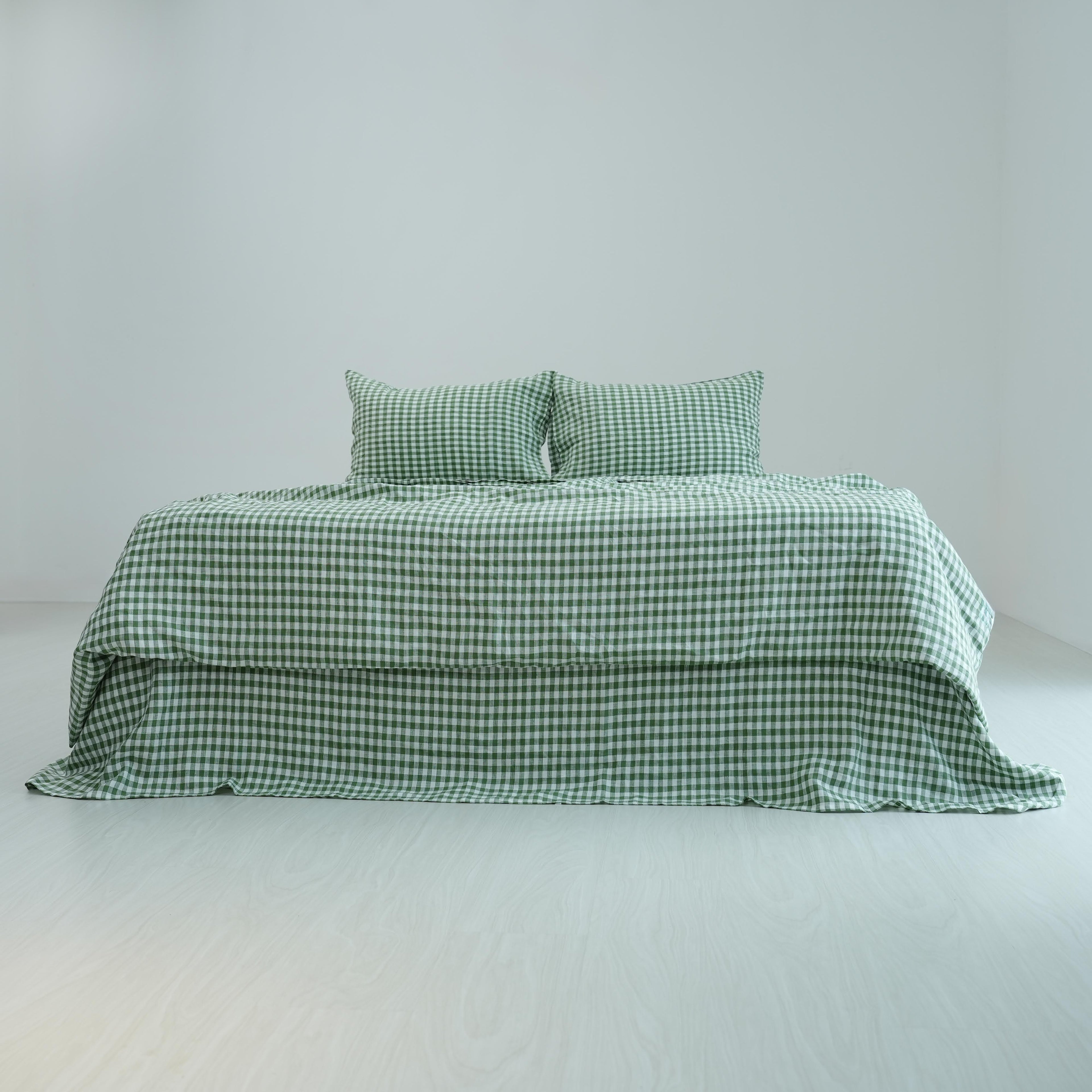 Green checkered French linen bedding set on a bed, 100% European flax - SCANDALINEN