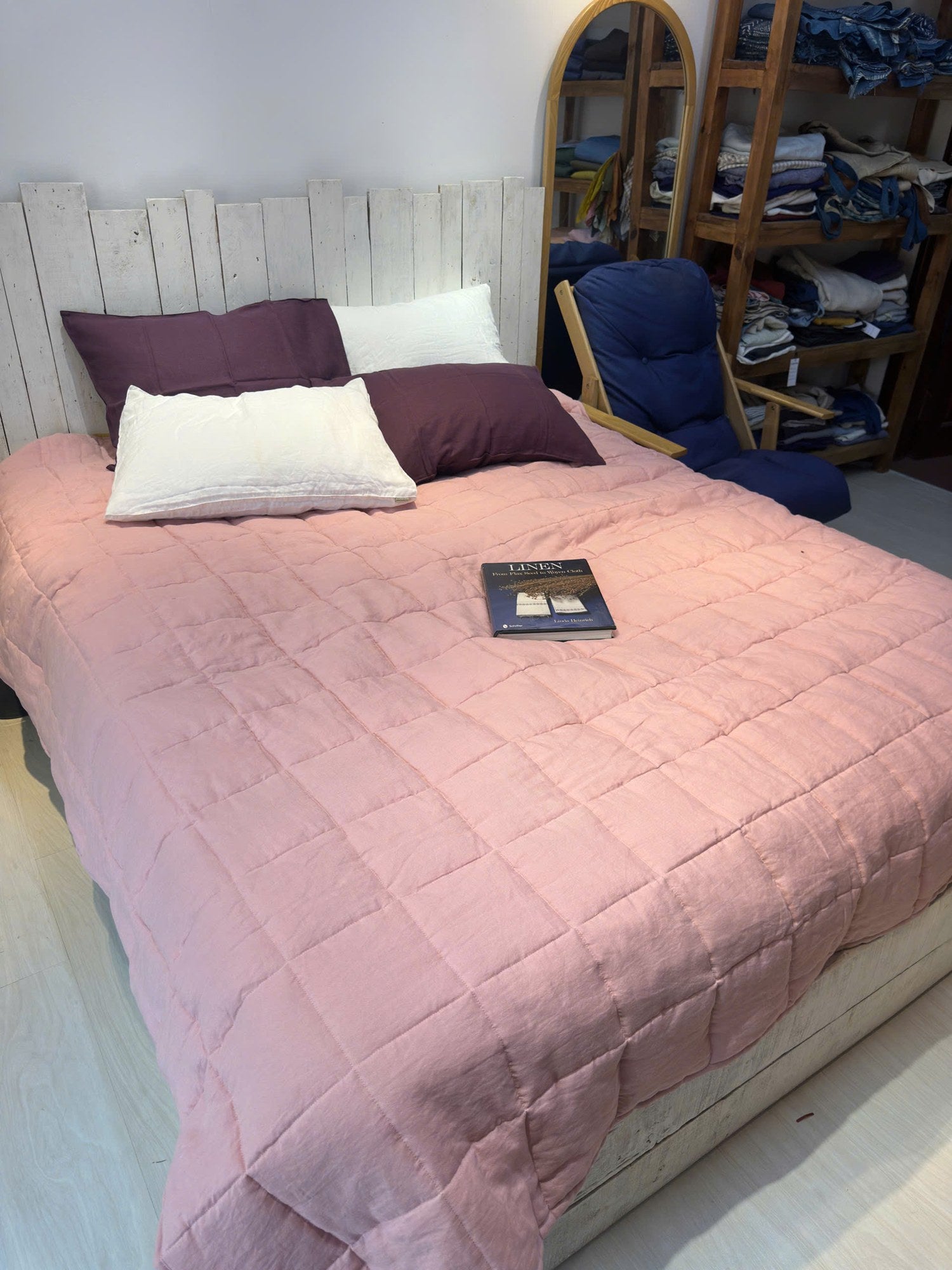 Dusty Pink French linen quilted blanket on a bed, 100% European flax, stonewashed - SCANDALINEN