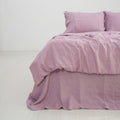 Purple French linen flat sheet on a bed, 100% European flax, stonewashed - SCANDALINEN