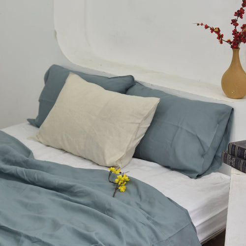 Aegean blue bamboo linen pillowcases on a bed, 45% linen 55% bamboo rayon, breathable - SCANDALINEN
