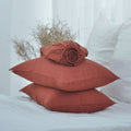 Red French linen fitted sheet set on a bed, 100% European flax, stonewashed - SCANDALINEN