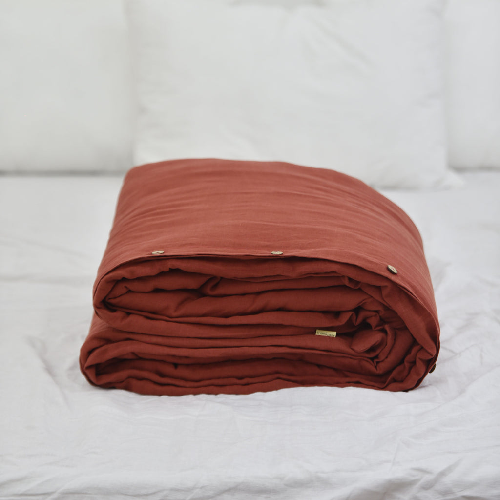 Red French linen duvet cover on a bed, 100% European flax, stonewashed - SCANDALINEN