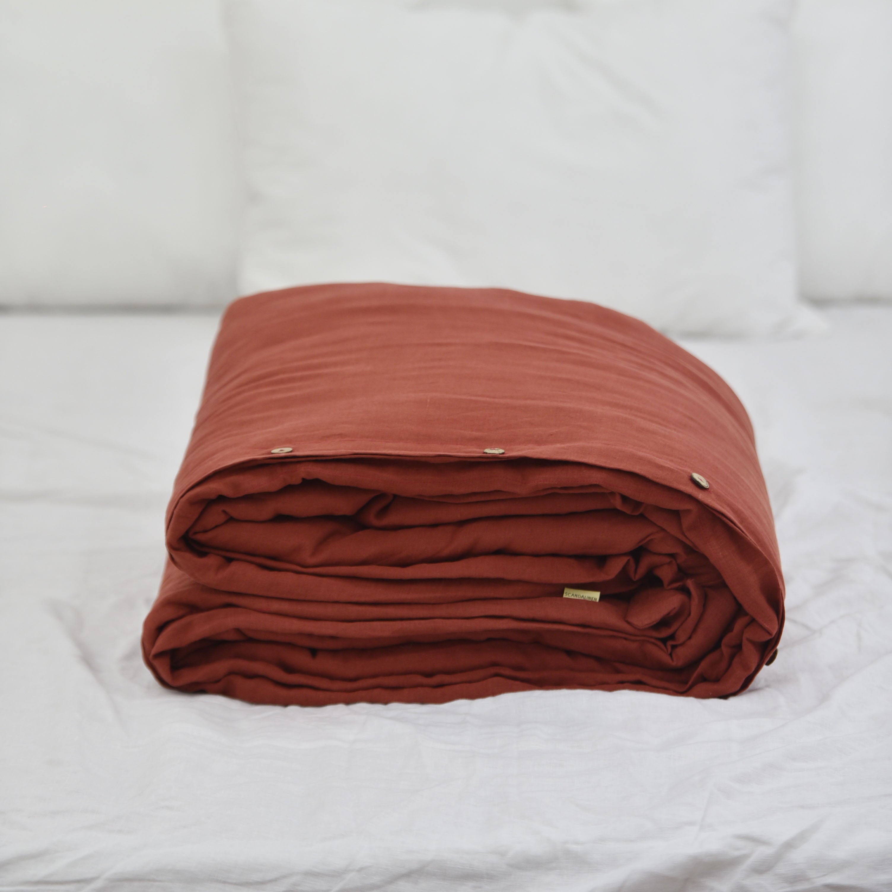 Red French linen duvet cover on a bed, 100% European flax, stonewashed - SCANDALINEN