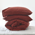 Red French linen duvet cover set on a bed, 100% European flax, stonewashed - SCANDALINEN
