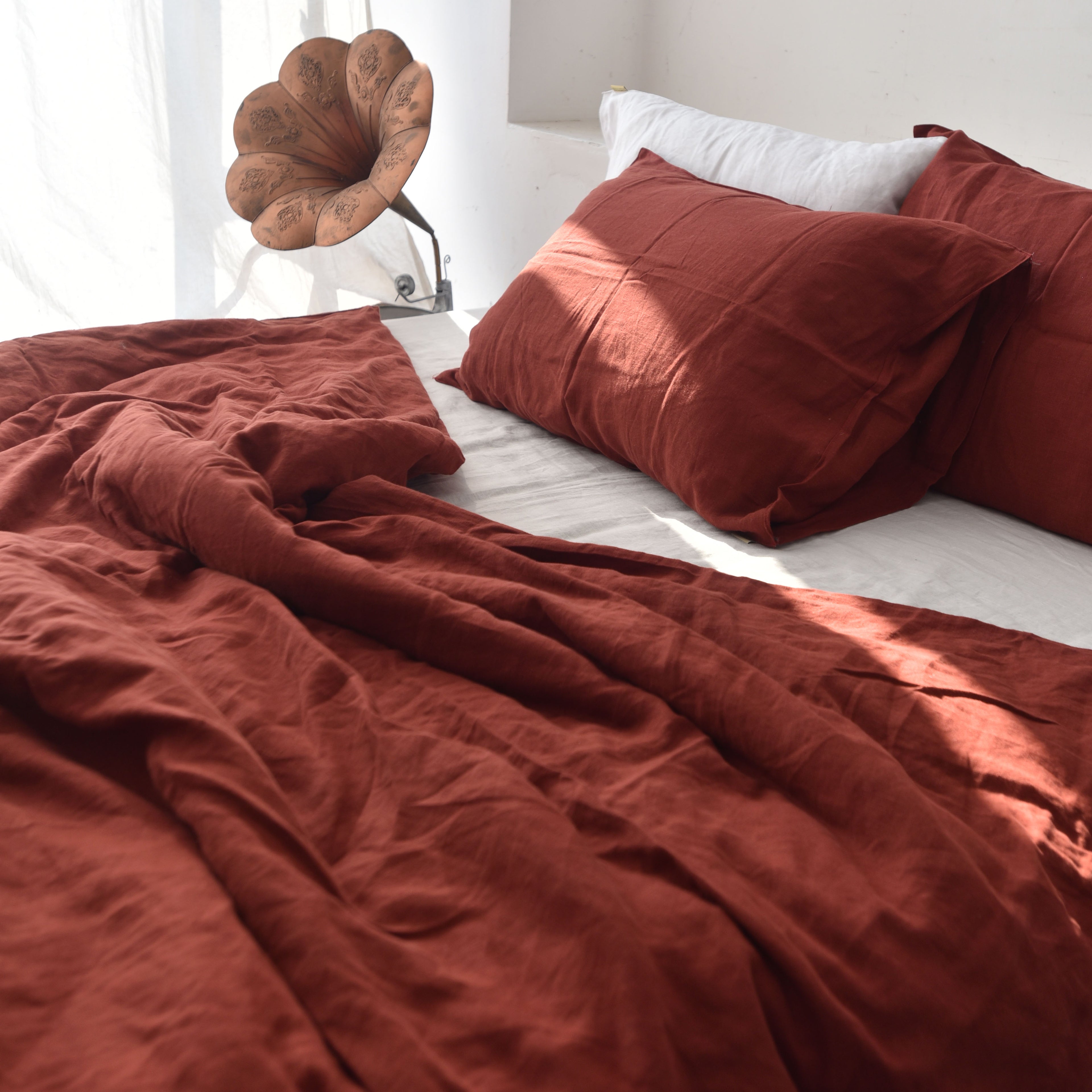 Red French linen duvet cover set on a bed, 100% European flax, stonewashed - SCANDALINEN