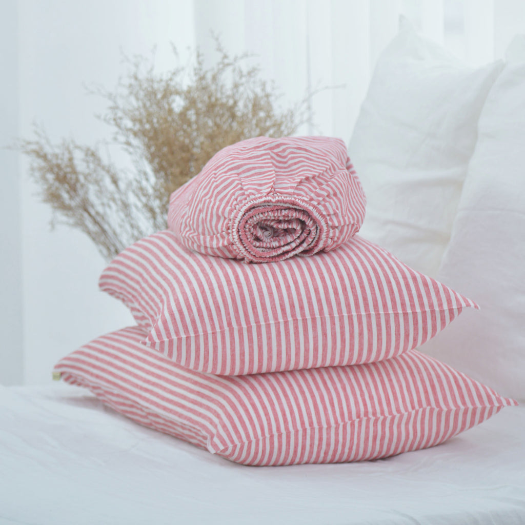 Red striped French linen sheet set on a bed, 100% European flax, stonewashed - SCANDALINEN