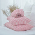 Red striped French linen sheet set on a bed, 100% European flax, stonewashed - SCANDALINEN