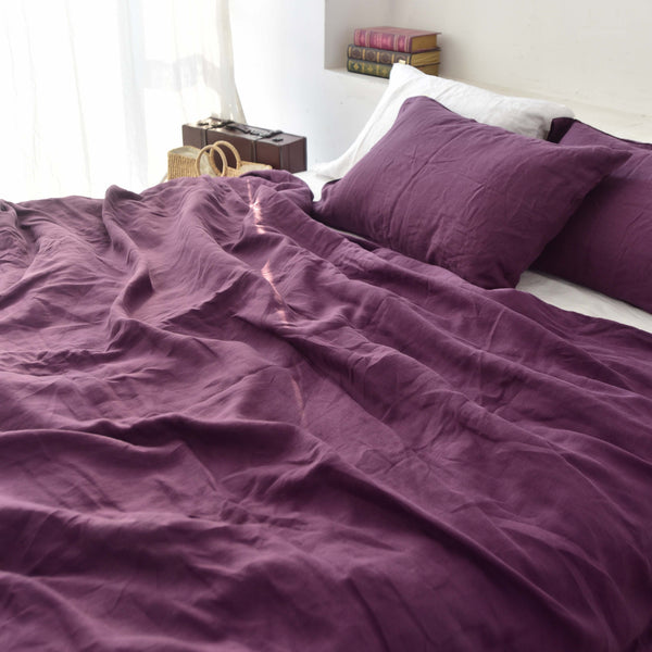 Violet purple French linen duvet cover set on a bed, 100% European flax, stonewashed - SCANDALINEN